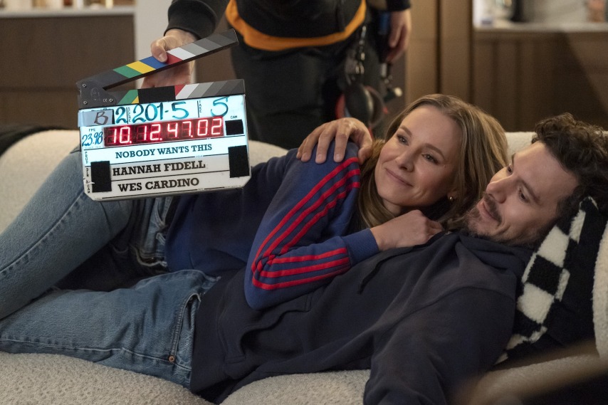 nobody wants this set photo kristen bell and adam brody cuddling on a couch