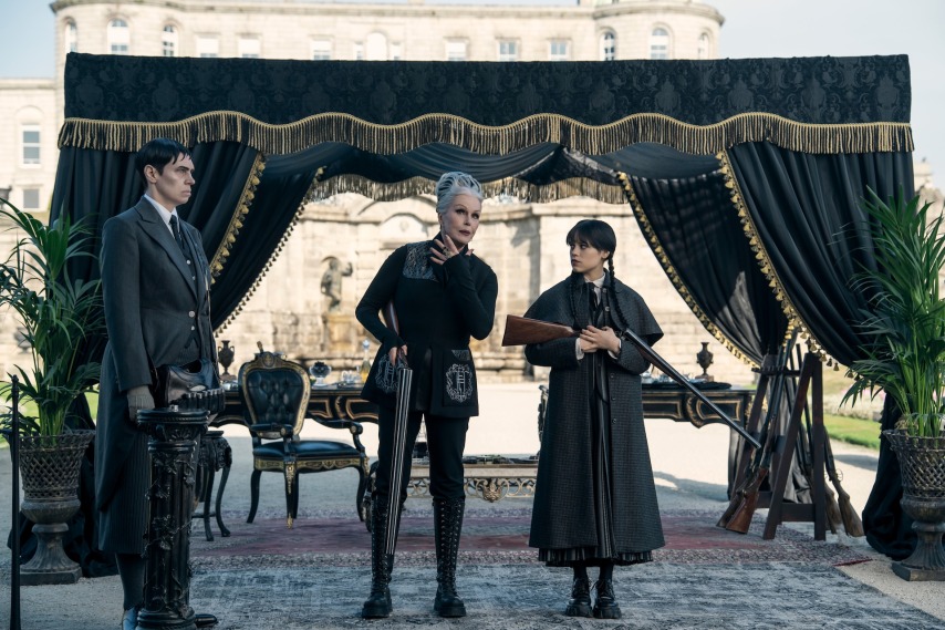 Wednesday. (L to R) Liv Spencer as Varicose, Joanna Lumley as Grandmama, Jenna Ortega as Wednesday Addams in episode 206 of Wednesday. Cr. Bernard Walsh/Netflix © 2025