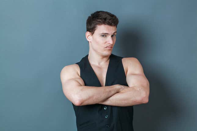 He wore a vest with no shirt under it at a fancy Italian restaurant.