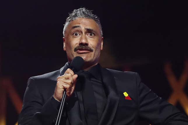 'It's Fine': Taika Waititi On the 'Viral' Photo of Tessa Thompson and Rita Ora Making Out in Front of Him