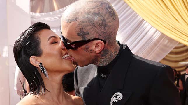 Kourtney Kardashian and Travis Barker Brought Their Tongues to the Oscars