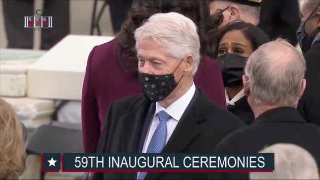 Bill Clinton Wears His Mask Like Every Man in a Suburban Grocery Store