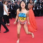 Activist Crashes Cannes Red Carpet to Protest Rape in Ukraine