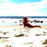 Elsewhere, Britney Spears is Doing Beach Yoga