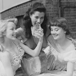 Here's Audrey Hepburn As a Chorus Girl Balancing Her Friend's Butt on a Block of Ice