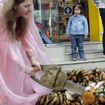 Here Are Some Pictures of Greenpeace Barbie Cutting Off a Costume Tiger's Head With a Chainsaw