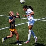 Soccer Players Put Their Heads Together