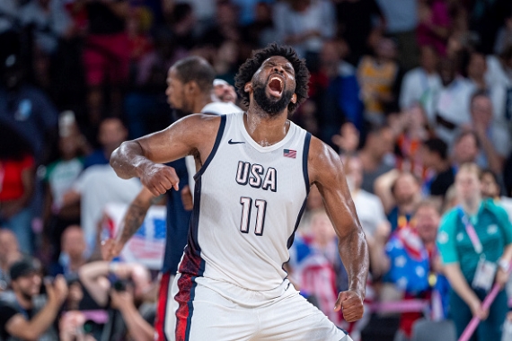 PARIS, FRANCE - AUGUST 8: Joel Embiid #11 of United States celebrates during a Men's basketball semifinals match between Team United States and Team Serbia on day thirteen of the Olympic Games Paris 2024 at Bercy Arena on August 08, 2024 in Paris, France.