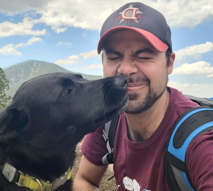Rocky sniffing my nose just as I took a photo of us in the mountains as I crinkle my nose