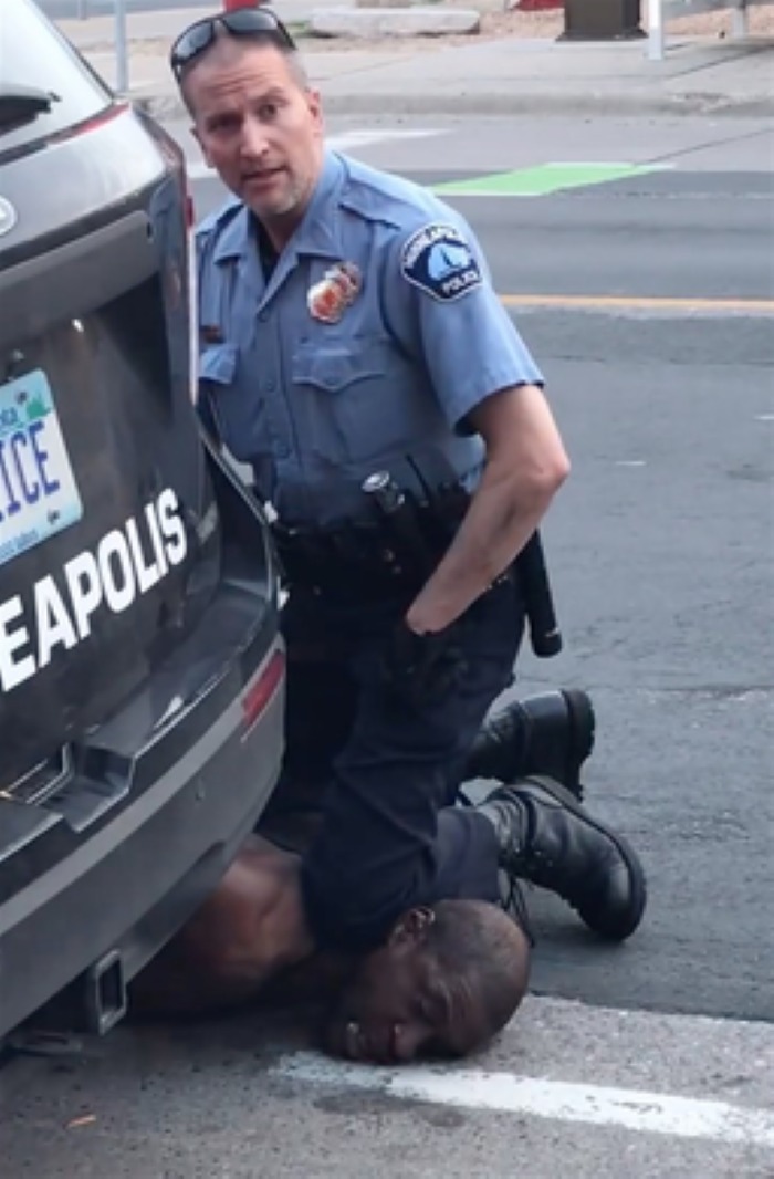 Frame from witness video, showing officer Derek Chauvin kneeling on George Floyd's neck (Darnella Frazier/Facebook post/Wikimedia Commons)