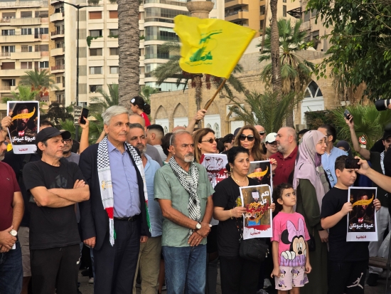 A group of people stand in solidarity together