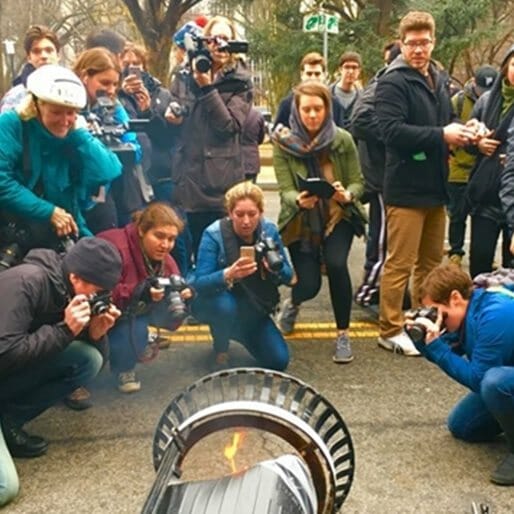What Does It Say About the Media When They Flock to Photograph a Small Flame Contained within a Trash Can?