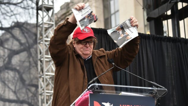 Michael Moore Rips Up a Copy of Washington Post at Women’s March