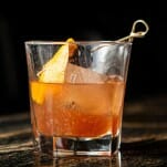 Cocktail Queries: Why Flame a Citrus Peel Above a Drink?