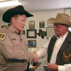 Watch Conan Transform Into a Trigger-Happy Texas Deputy