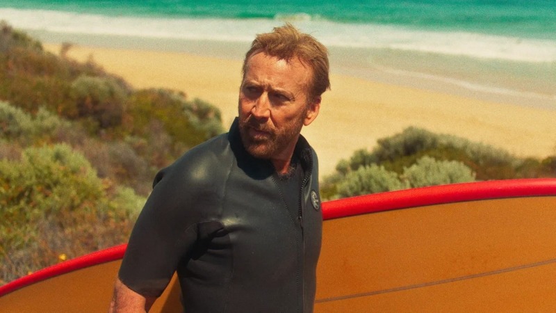 Even a Sunburnt Nic Cage Can’t Keep The Surfer Afloat